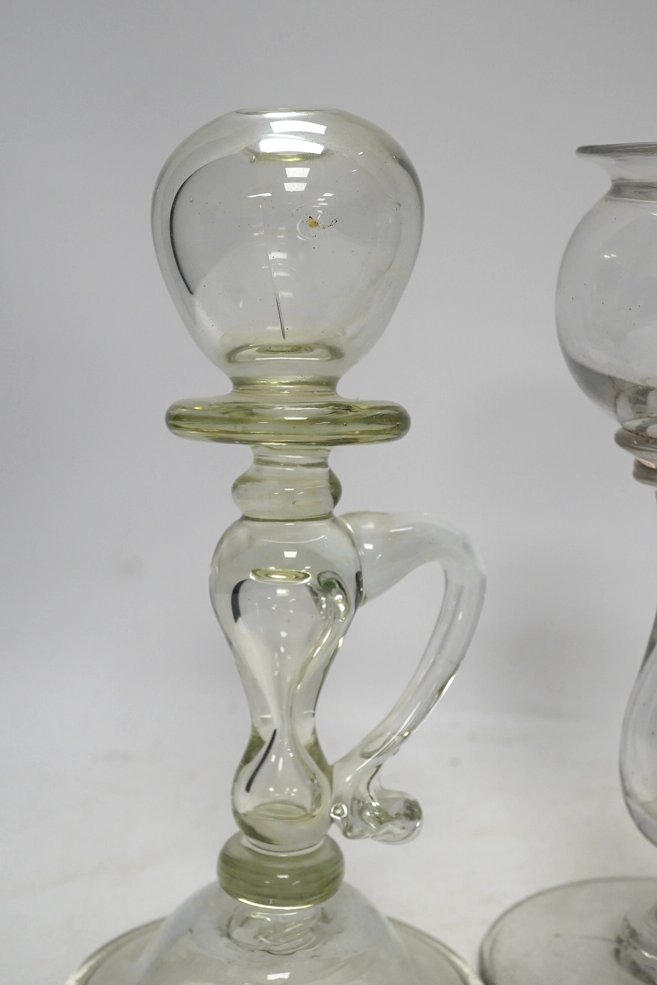 Three 18th century glass lacemaker's lamps, tallest 18cm. Condition - good